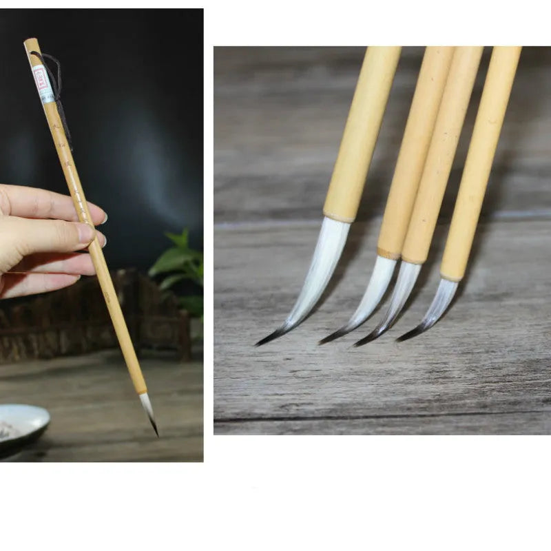 Four traditional Chinese calligraphy brushes with thin gold bodies and pine branch design