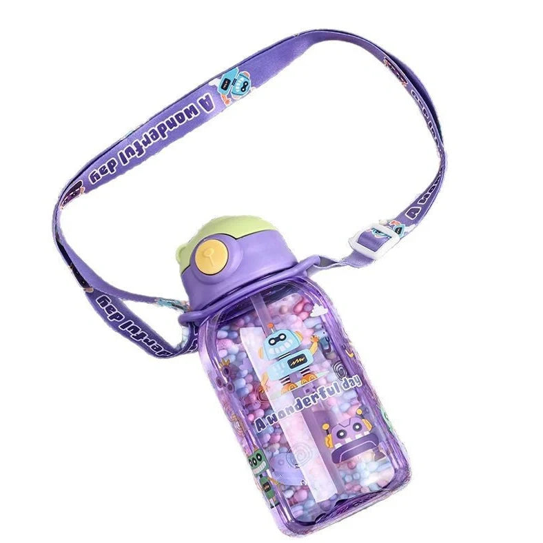 Red children's water cup with shoulder strap showing cartoon pattern and suction nozzle