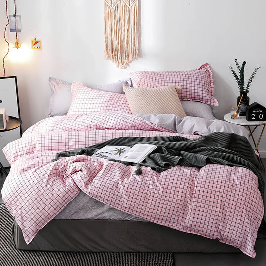 Pink polyester bedding set with twill weave duvet cover, pillowcases, and deep pocket fitted sheet in UK sizes