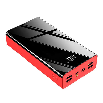 Large black and red 40000 mAh power bank with LCD display showing battery percentage