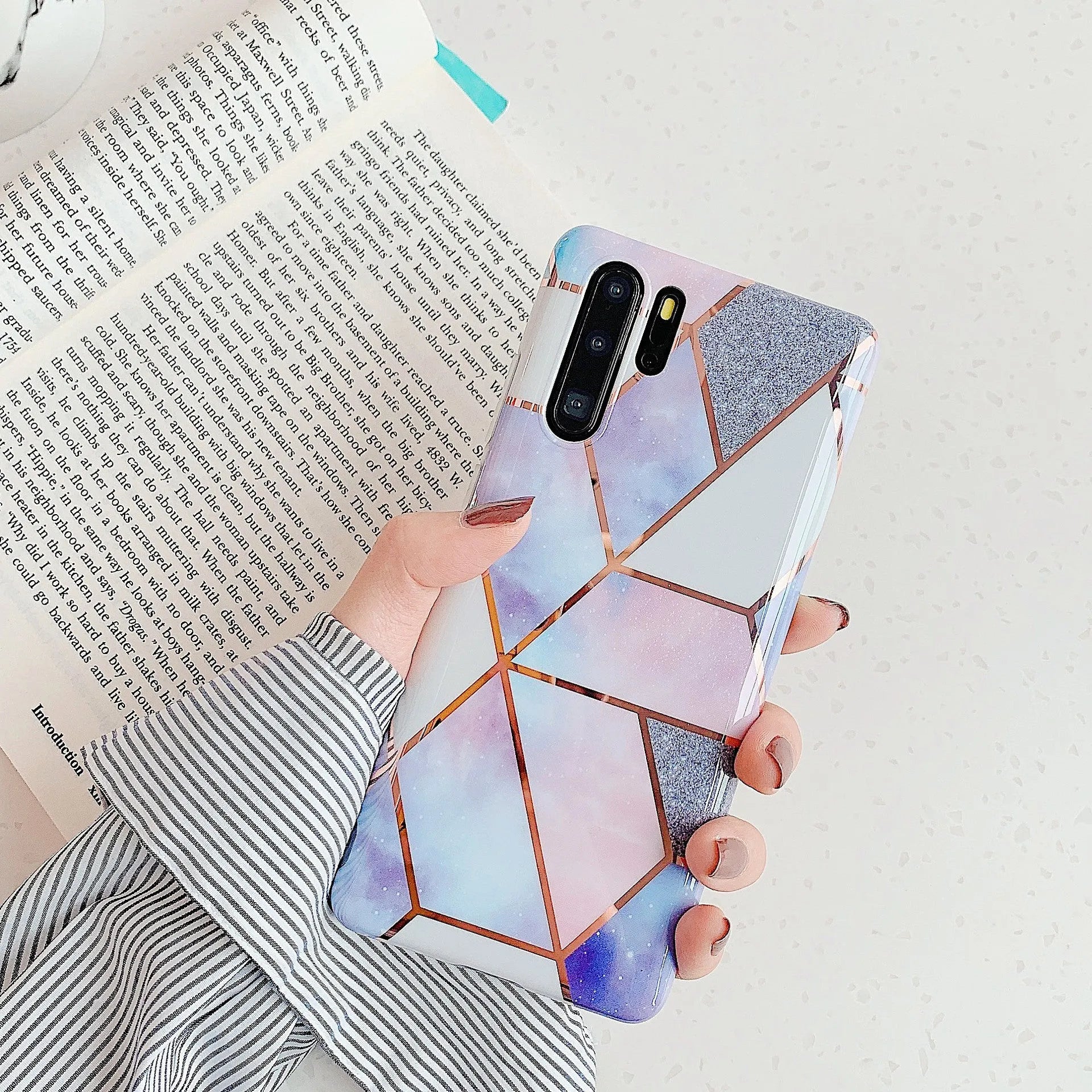 Electroplated marble mobile phone case in various colours for Huawei and Samsung models, showing slim TPU back cover design