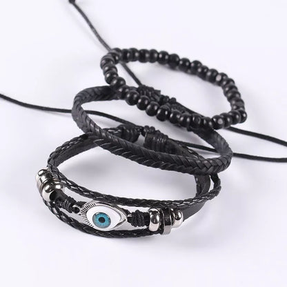 Braided leather cord brown eye bracelet with alloy charm