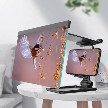 Black mobile phone screen amplifier with detachable holder, magnifying to 12 inches, folded for portability