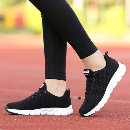 Women's running shoes with fly weaving upper material and wear-resistant outsole in black, pink, white colours