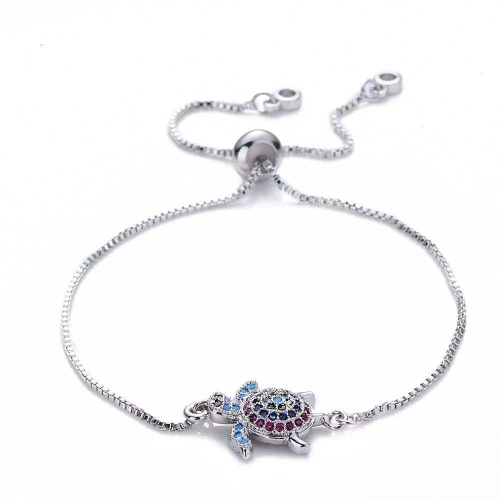 Adjustable sea turtle bracelet with sparkling rhinestones and amethyst inlay