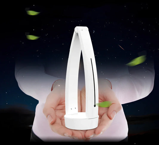 White folding LED desk lamp with touch control on wooden desk