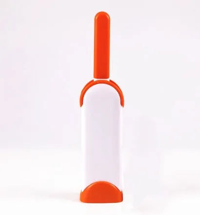 Blue reusable pet hair removal comb with sticky brush and self-cleaning base for sofas.
