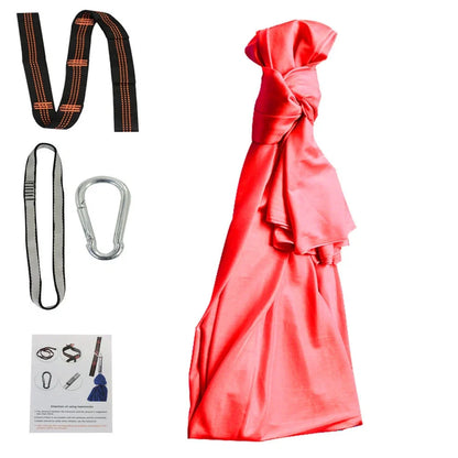 Child in black therapy swing cocoon with multi-loop daisy chain height adjustment system