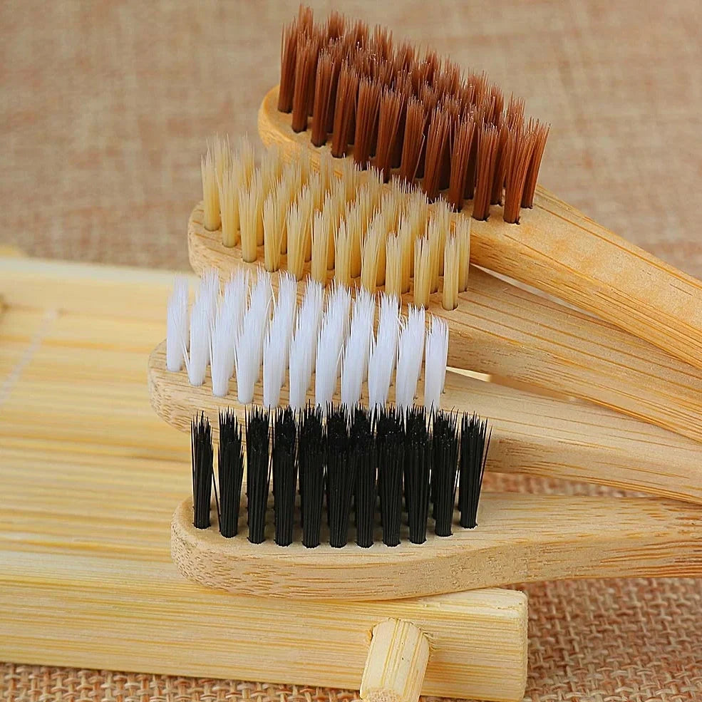 Organic bamboo toothbrush with 17.5cm ergonomic handle and charcoal-infused bristles for sustainable dental care