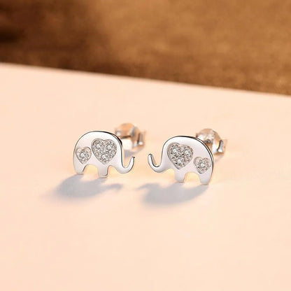 Small geometric silver earrings with gemstone setting in gold and silvery finishes