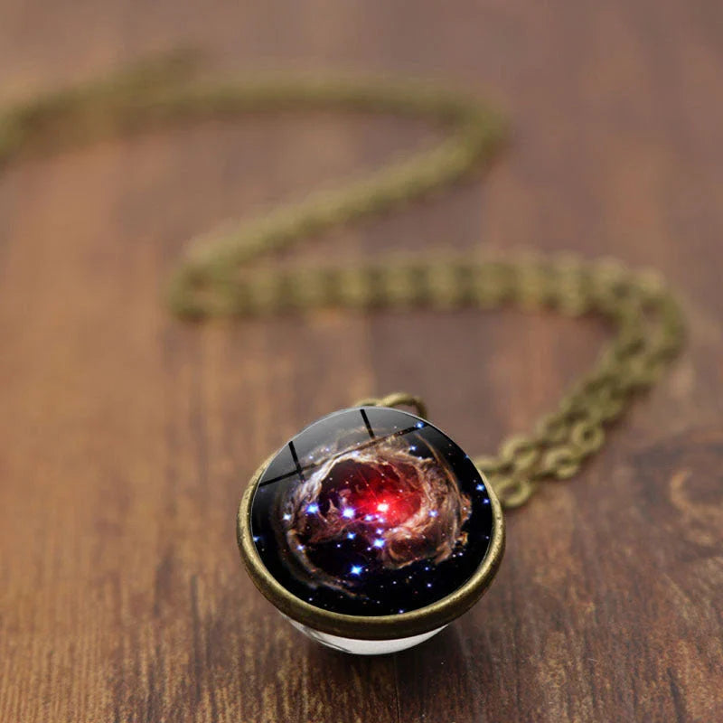 Mesmerizing double-sided galaxy pendant necklace in various celestial patterns and colors