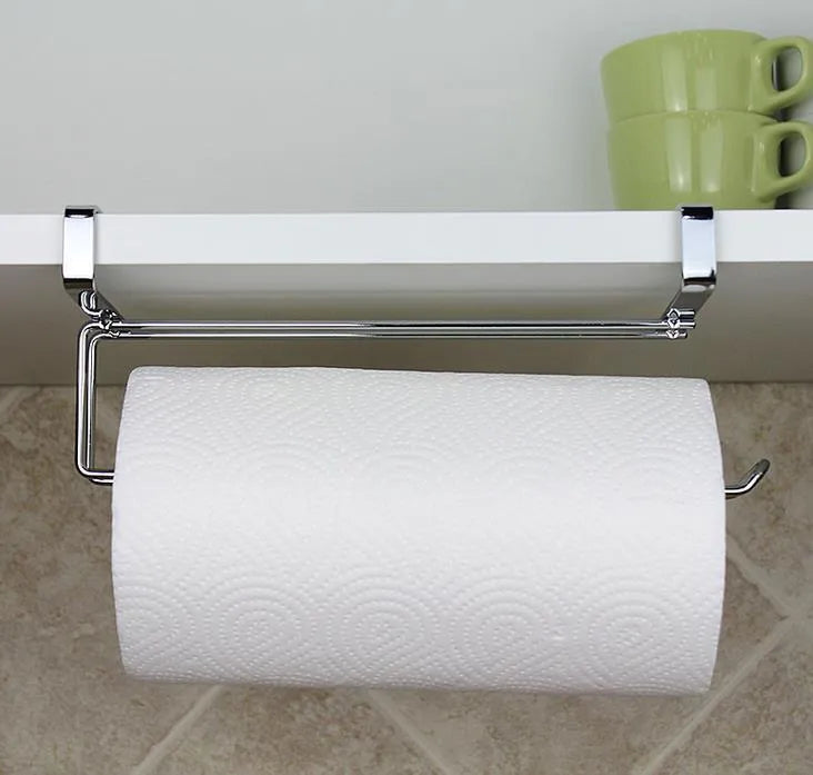 Silver stainless steel paper towel rack for hanging on the back of a kitchen cabinet door.