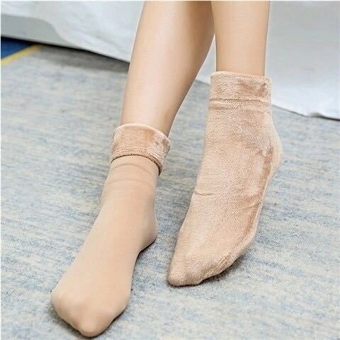 Cozy winter tube socks for men and women in black and skin color options