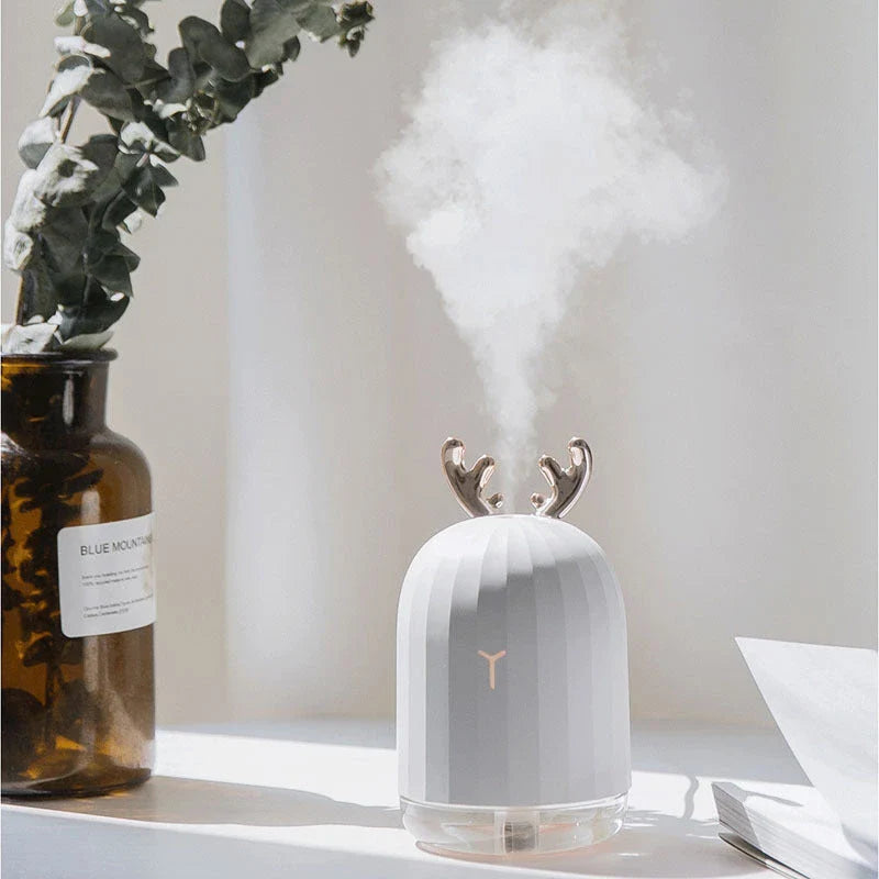 Compact deer-shaped humidifier with USB power for small spaces up to 100 square feet