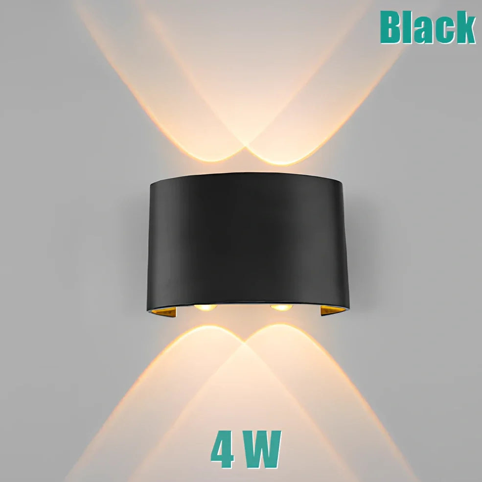 Waterproof black aluminium LED wall lamp 4W warm white emitting 60-degree beam angle mounted on white wall