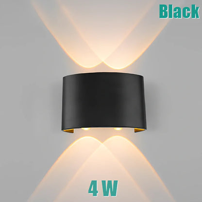 Waterproof black aluminium LED wall lamp 4W warm white emitting 60-degree beam angle mounted on white wall