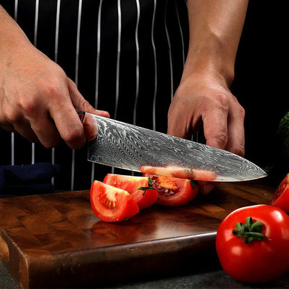 Premium 67-layer Damascus steel chef's knife with elegant brocade pattern, durable corrosion-resistant construction, and ergonomic handle for exceptional cutting performance