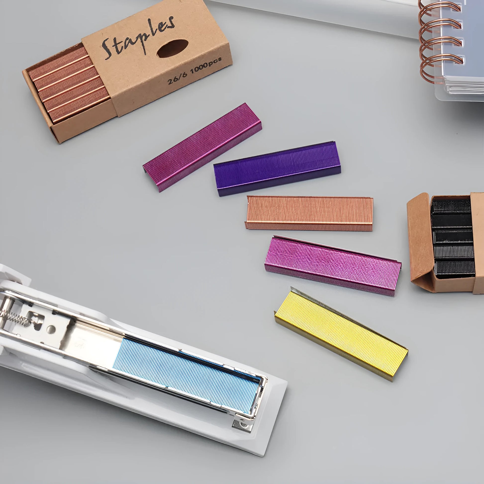 Box of 1000 metal staples in black, purple, rose gold, and rose red colour options