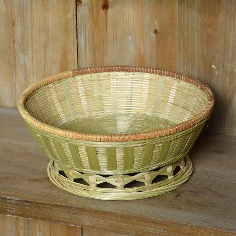 Handmade bamboo storage basket with woven design in 26x8cm, 25x9cm, and 24x12cm sizes on a wooden table
