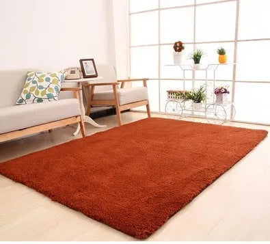 Solid colour plush area rug showing velvet pile texture and rectangular shape