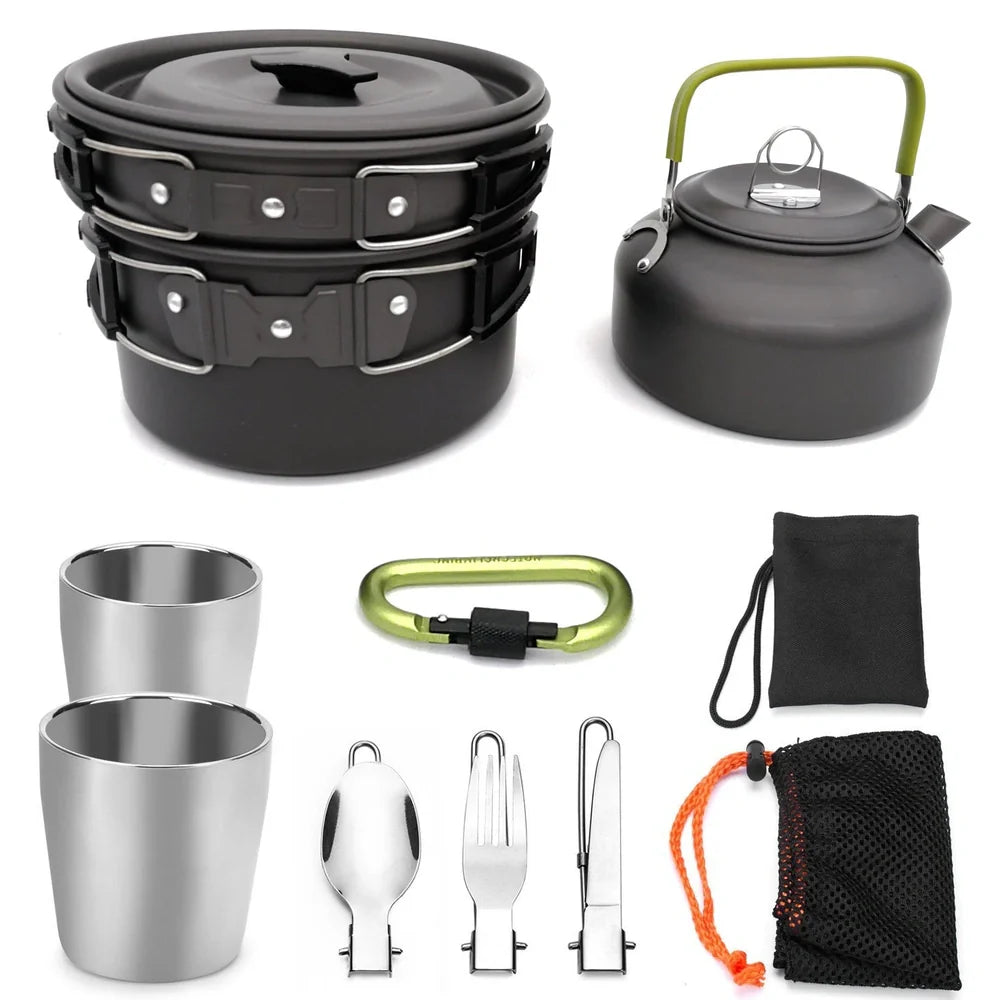Outdoor camping cookware set with saucepan, frying pan, teapot, and stainless steel cups in mesh storage bag