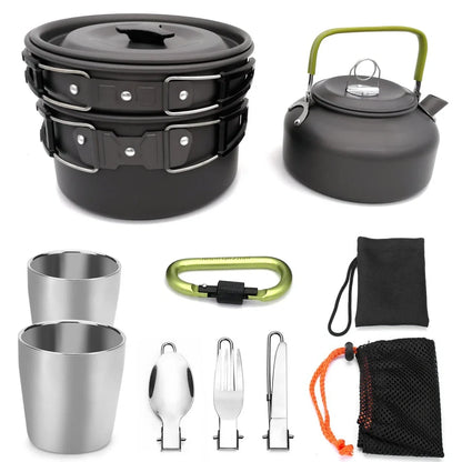 Outdoor camping cookware set with saucepan, frying pan, teapot, and stainless steel cups in mesh storage bag
