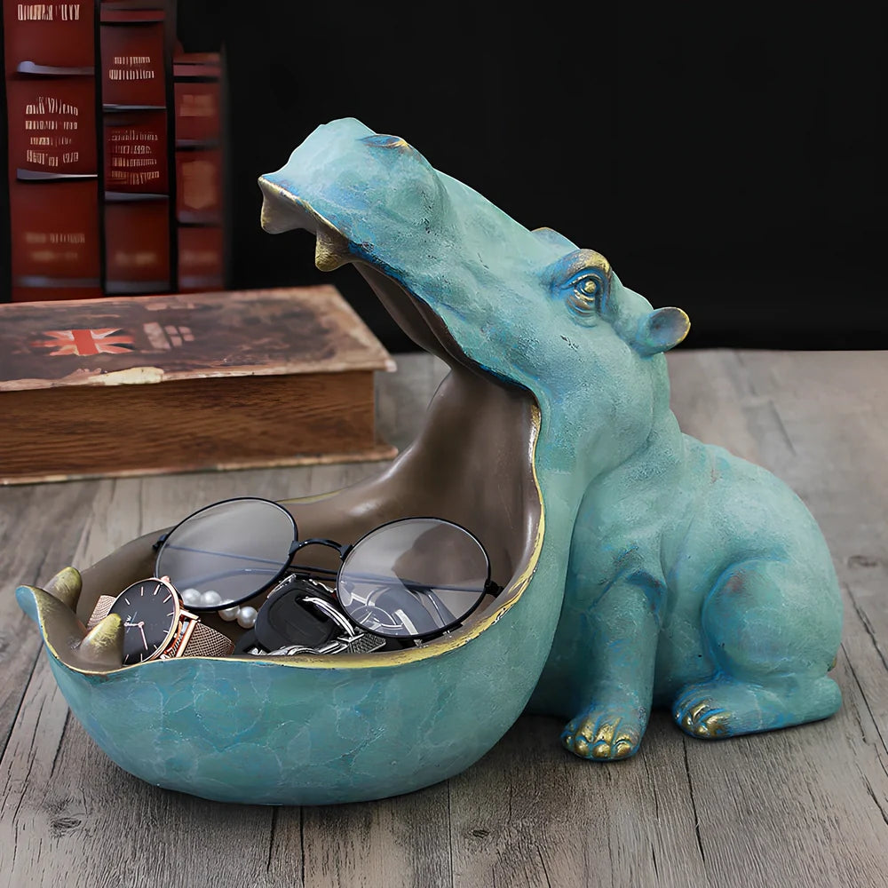 Handmade blue resin hippo storage figurine with removable top showing interior compartment
