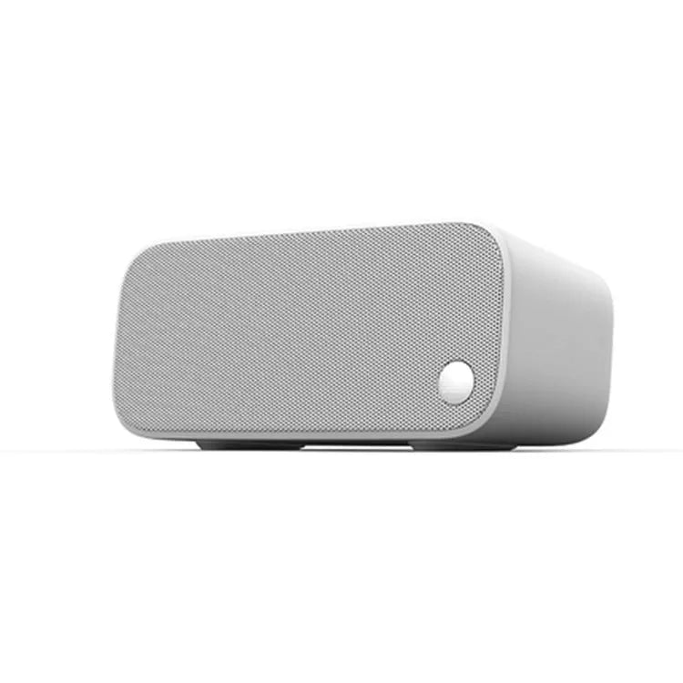 Elf Sugar Cube AI smart WiFi speaker in blue, green, red, or white colour on a shelf.
