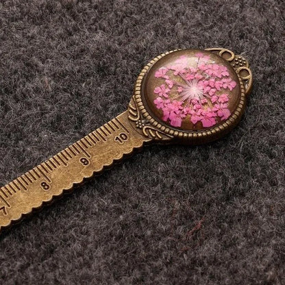 12cm handmade dried flower bookmark with gypsophila ruler featuring lace flowers, daffodils, and clover on blue background