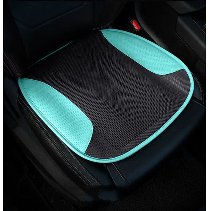 USB ventilated car seat cushion in black suede material with cable, placed on a car seat.