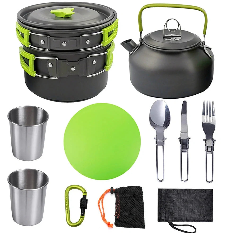 Outdoor camping cookware set with saucepan, frying pan, teapot, and stainless steel cups in mesh storage bag
