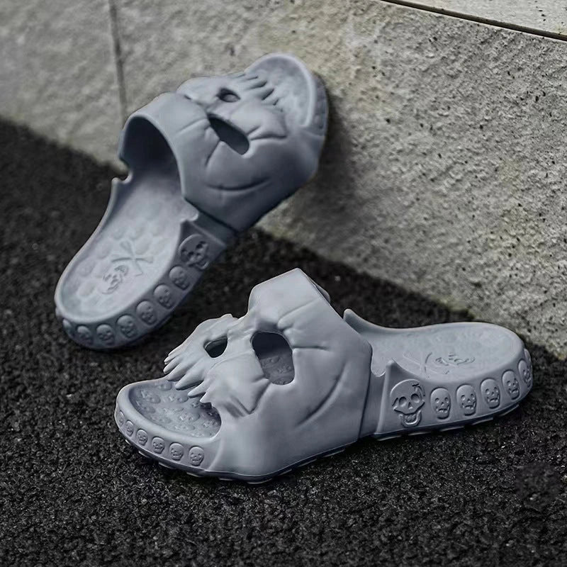 Spooky skull-printed slide sandals in various colors and sizes