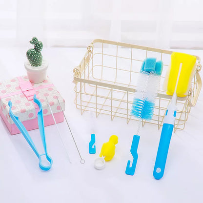 Orange Belle seven-piece bottle brush set in blue and pink, including sponge and nylon brushes for comprehensive cleaning