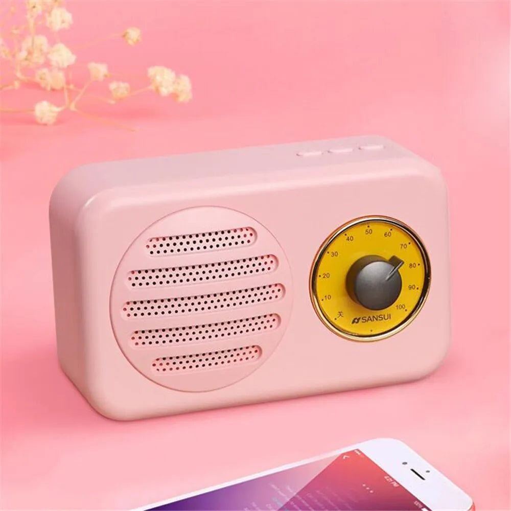 Portable Bluetooth wireless speaker with FM radio in wood grain finish