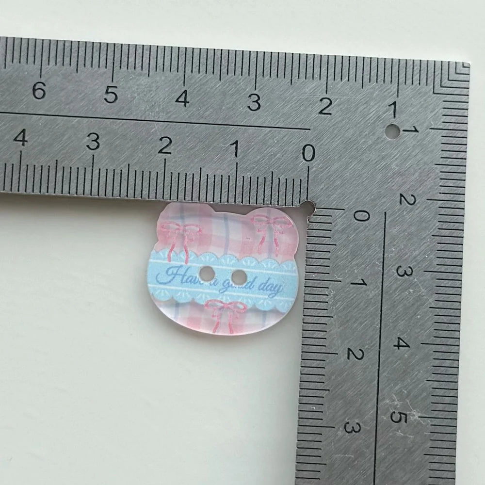 DIY acrylic button with cartoon plaid design measuring 2cm diameter for clothing customisation projects