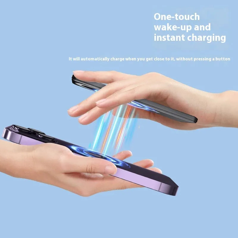 Ultra-thin dark gray magnetic power bank with alloy shell, shown next to a smartphone.