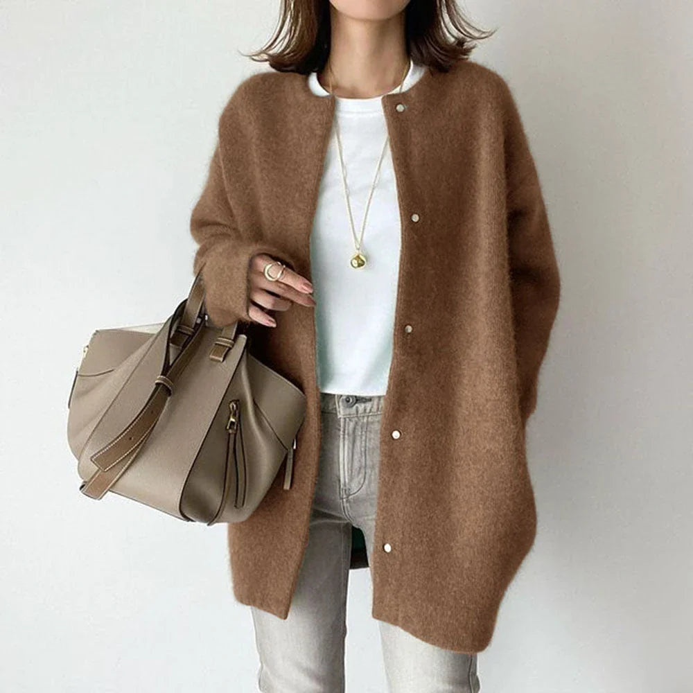 A cozy, knitted cardigan jacket in a variety of colors and sizes, featuring a relaxed open-front silhouette and premium construction for versatile layering.