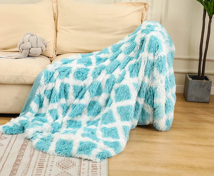 Soft, plush sherpa throw blanket in a variety of colors and sizes, perfect for cozy relaxation on the sofa or bed