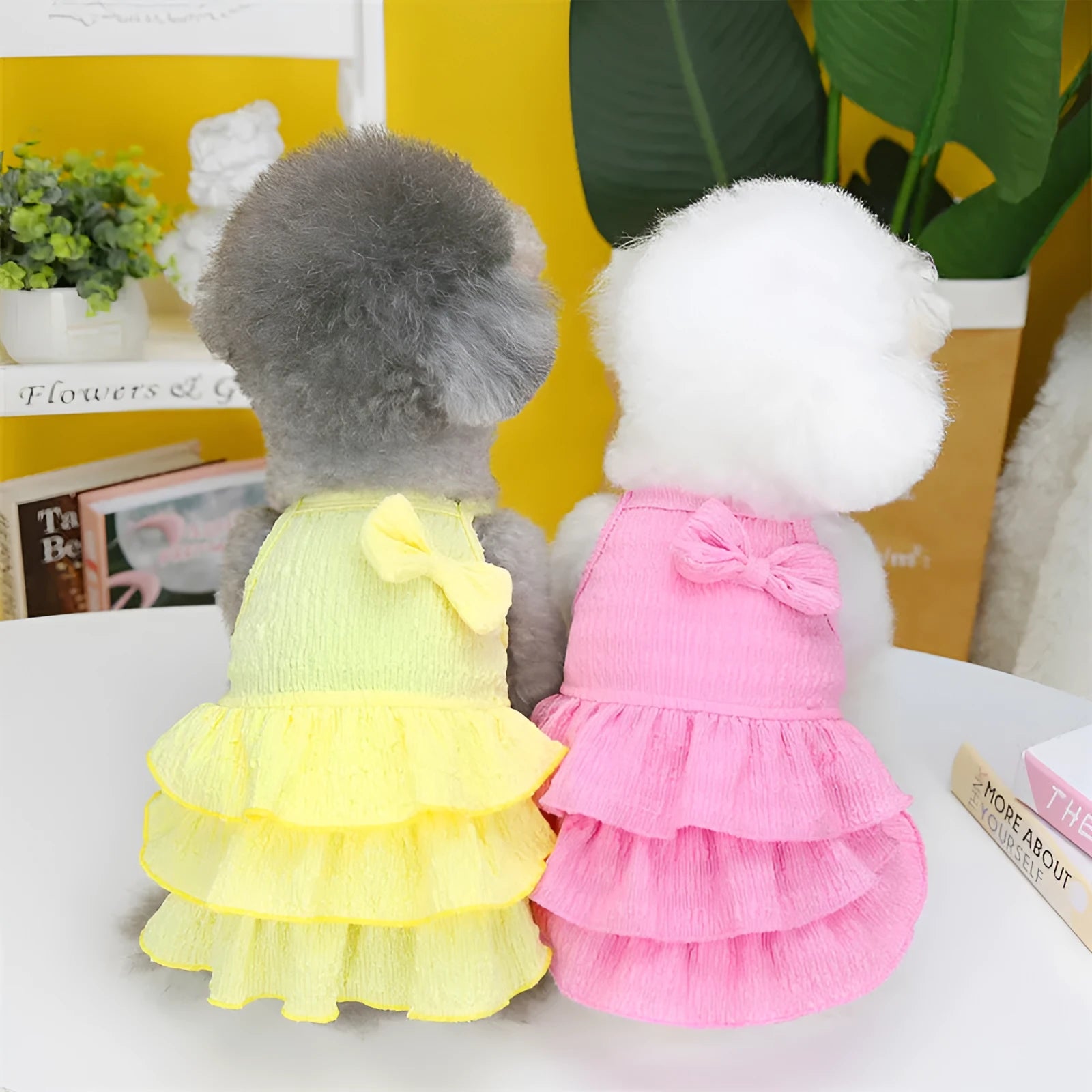 Small dog wearing polyester princess dress with layered skirt in rose red colour