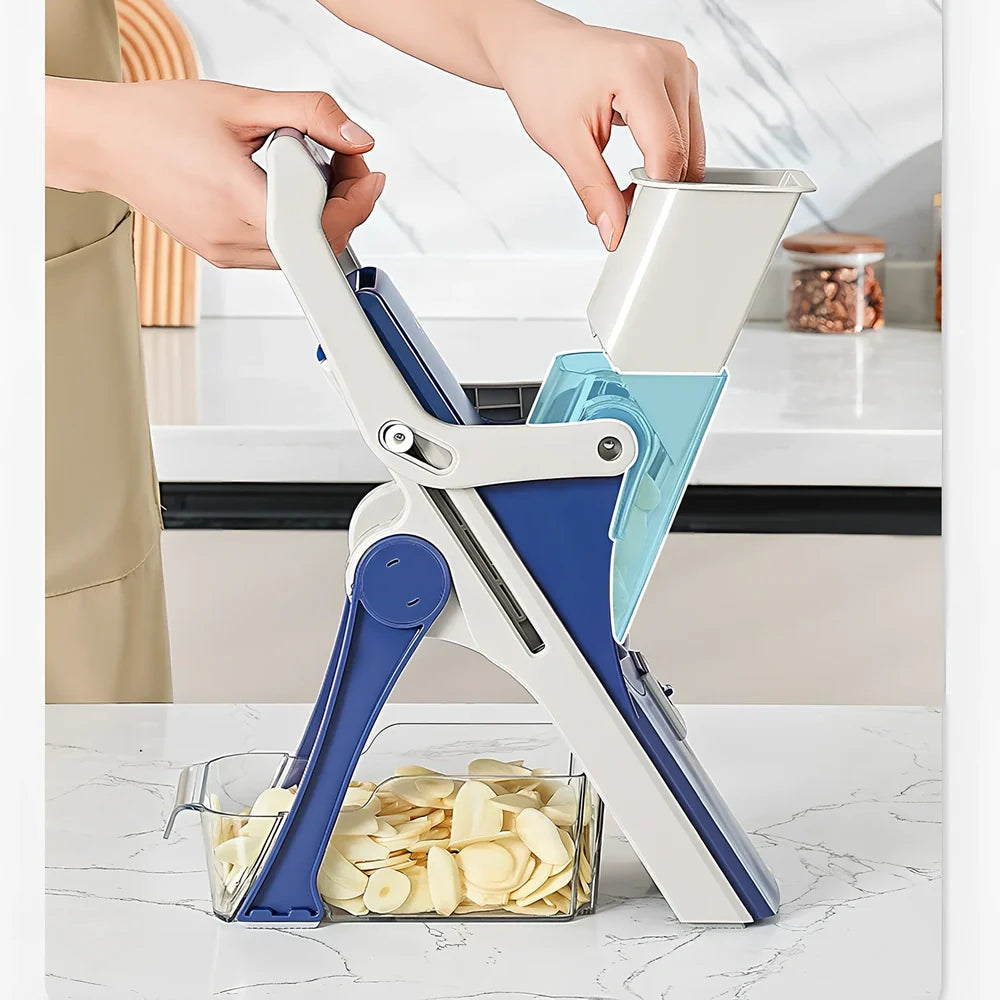 Purple kitchen vegetable chopper with stainless steel blades and wire planer attachment on 41cm workspace