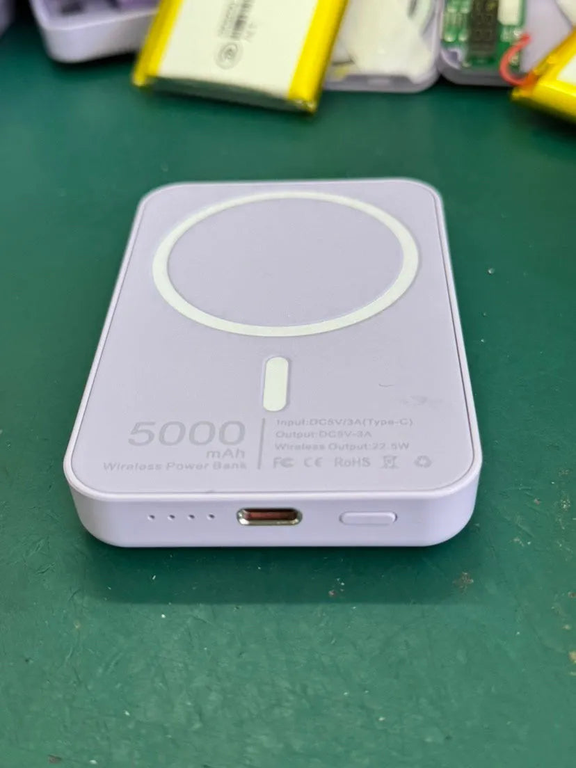 White magnetic wireless charging power bank with 5000mAh capacity and creative design