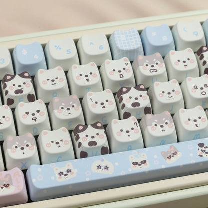 Full set of PBT key caps with sublimated cat and puppy design for mechanical keyboards.