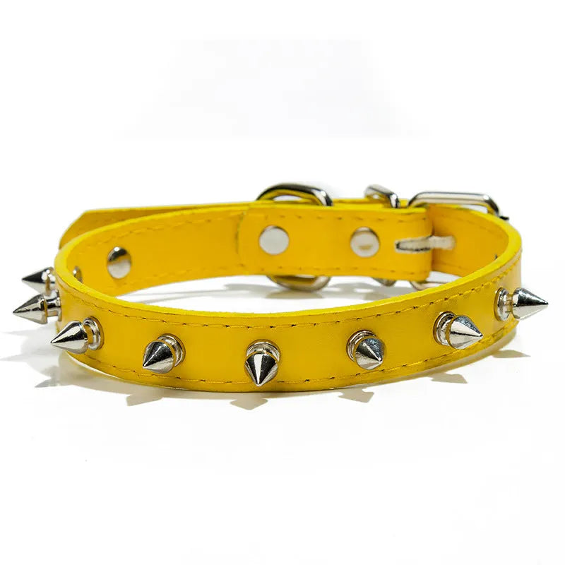 Spiked black PU leather dog collar with metal studs and an alloy metal fastener.