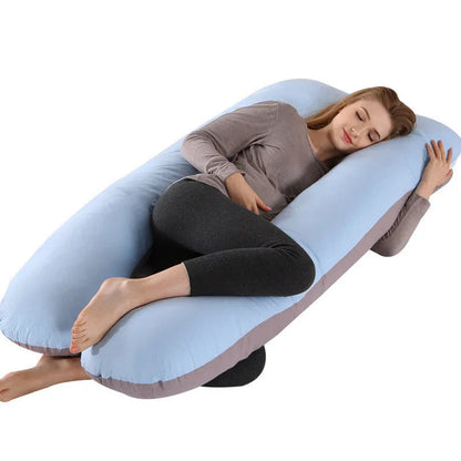 Large U-shaped pregnancy support pillow with removable cover and abdominal support belt.