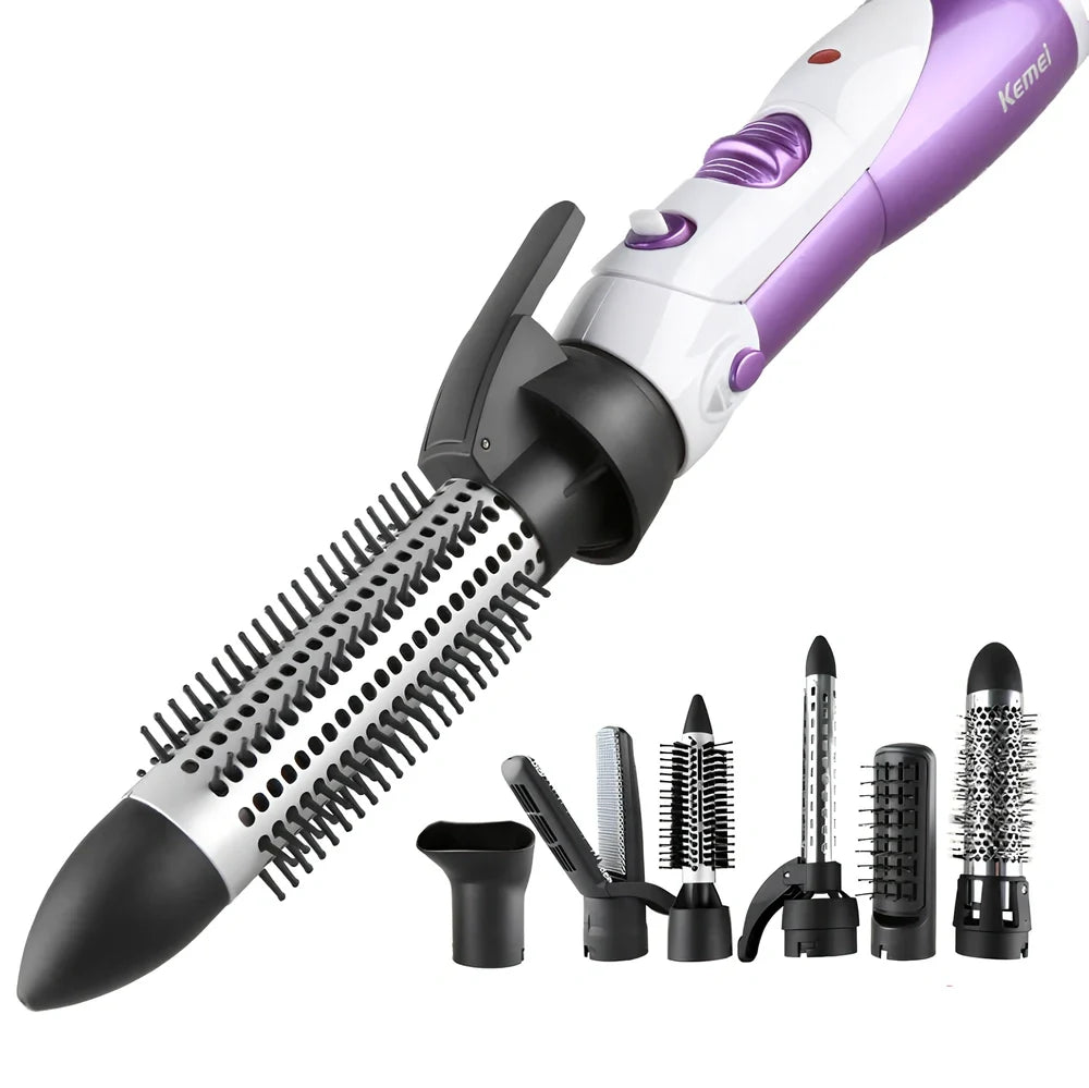 Purple folding hair dryer with diffuser attachment showing compact 20.5cm size