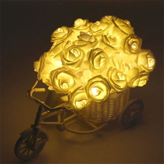 Battery-powered rose flower string lights in various colors and lengths, suitable for holiday, wedding, and party decor