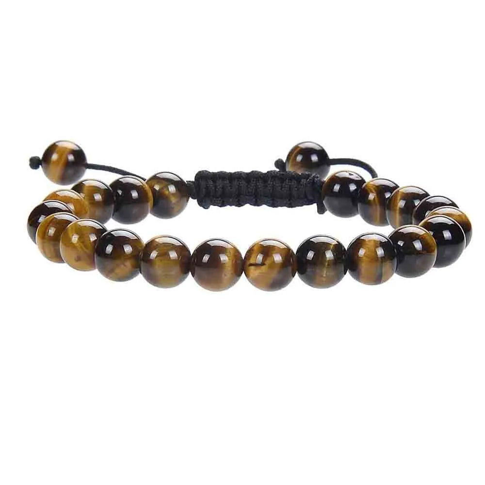 Close-up of a women's flat knot braided healing bracelet hand-woven with colourful gemstones.