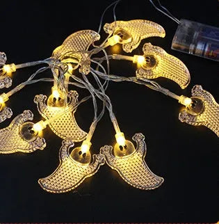 Halloween LED string lights with pumpkin, ghost and bat decorations on 1.2 metre battery-powered cord