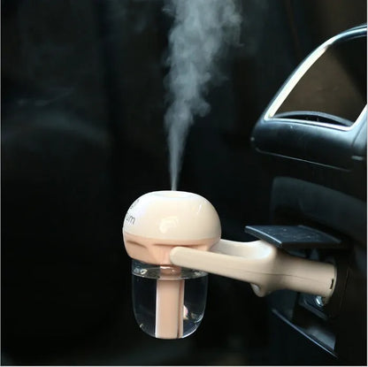 Portable car humidifier unit showing compact design with rotation capability for vehicle use