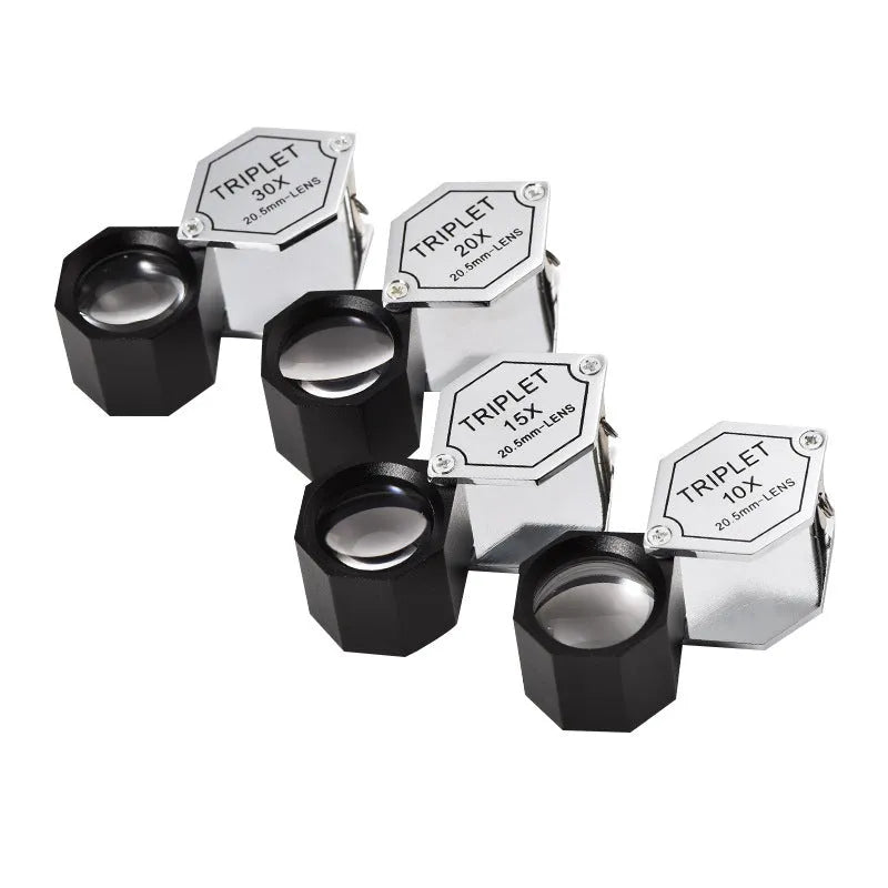 Handheld metal and optical glass magnifying glass for jewellery, stamp, and coin identification with 10x to 30x magnification.